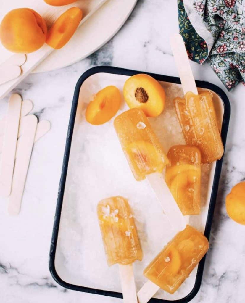 PEACH ICE LOLLIES ON A TRAY