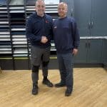 Image of Nick Mooney shaking hands with Lou Tully on the aquisition of Tullys Appliances to the Ruislip Appliances Group